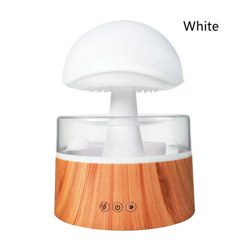 White cloud-shaped humidifier with falling water droplets and coloured night light