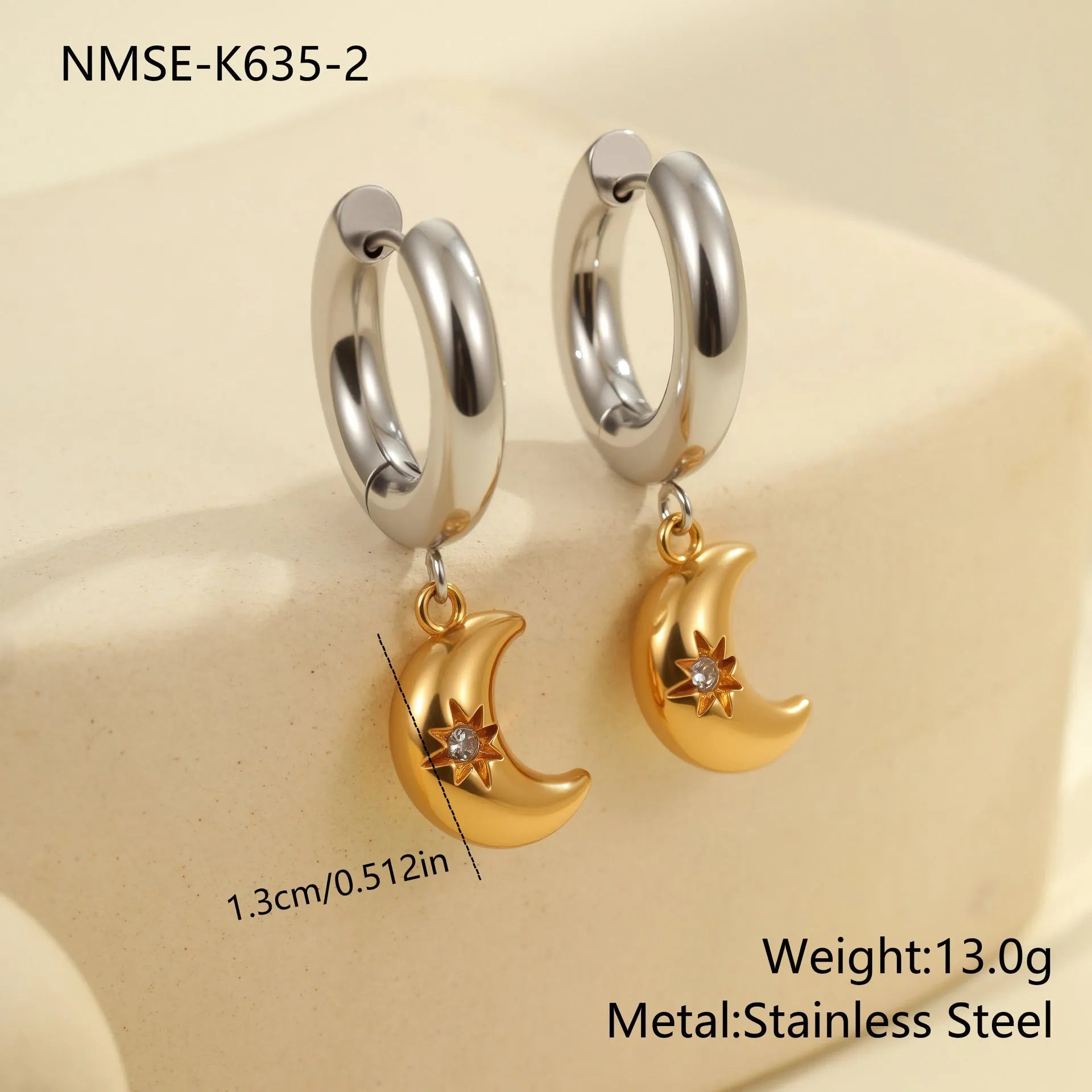 Women's stainless steel drop earrings with 18K gold electroplating in Christmas tree and heart shapes.