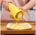 Yellow manual corn thresher kitchen tool with a corn-kernel-shaped plastic handle.