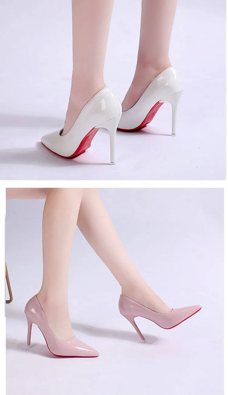 Women's black pointed toe stiletto pump with a shallow cut, shown on a white background.