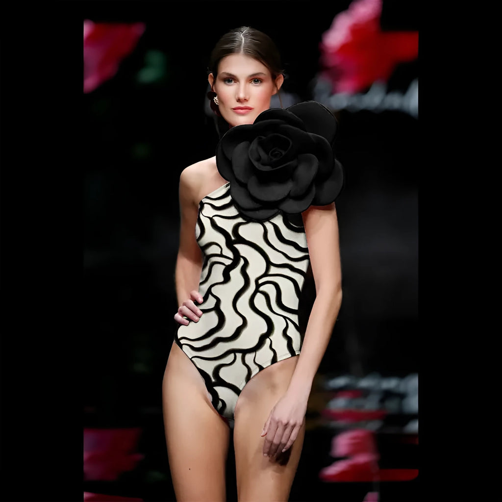 One-piece European American style swimsuit with three-dimensional floral patterns on solid colour background