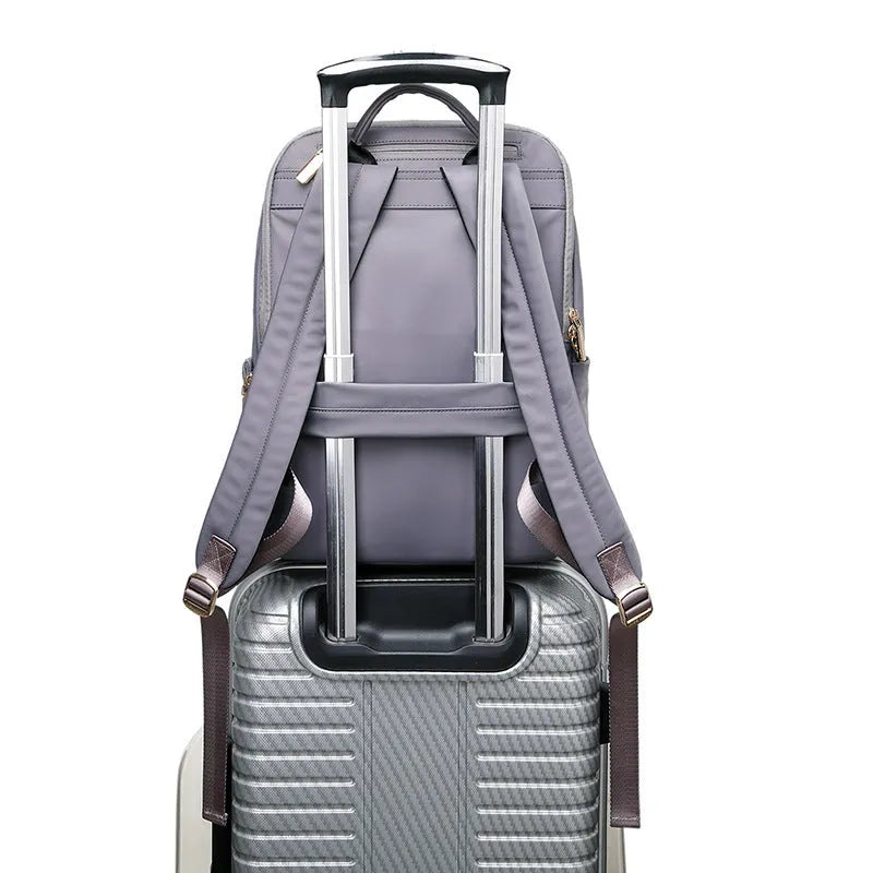 Oxford cloth women's backpack in black and purplish grey with anti-theft features and waterproof construction