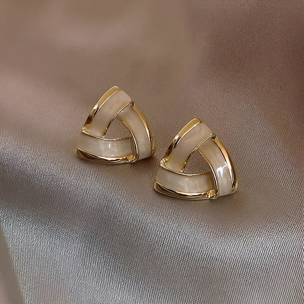 Women's yellow gold geometric triangle stud earrings with inlaid zircon on copper base