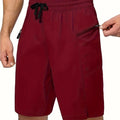 Men's quick-drying polyester beach shorts in straight cut available in nine different colours