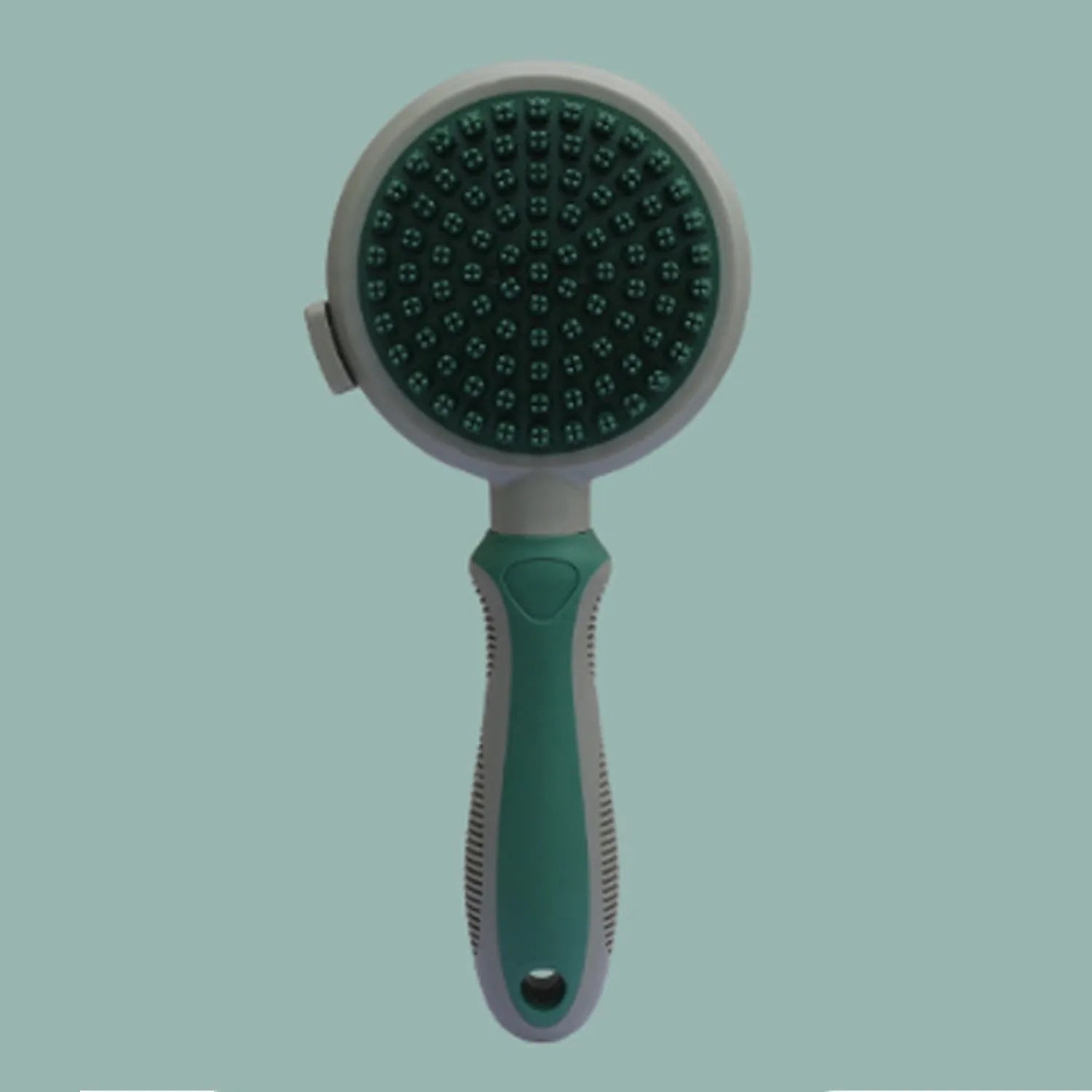 Green and pink double-sided cat brush with release button and flea comb for pet grooming