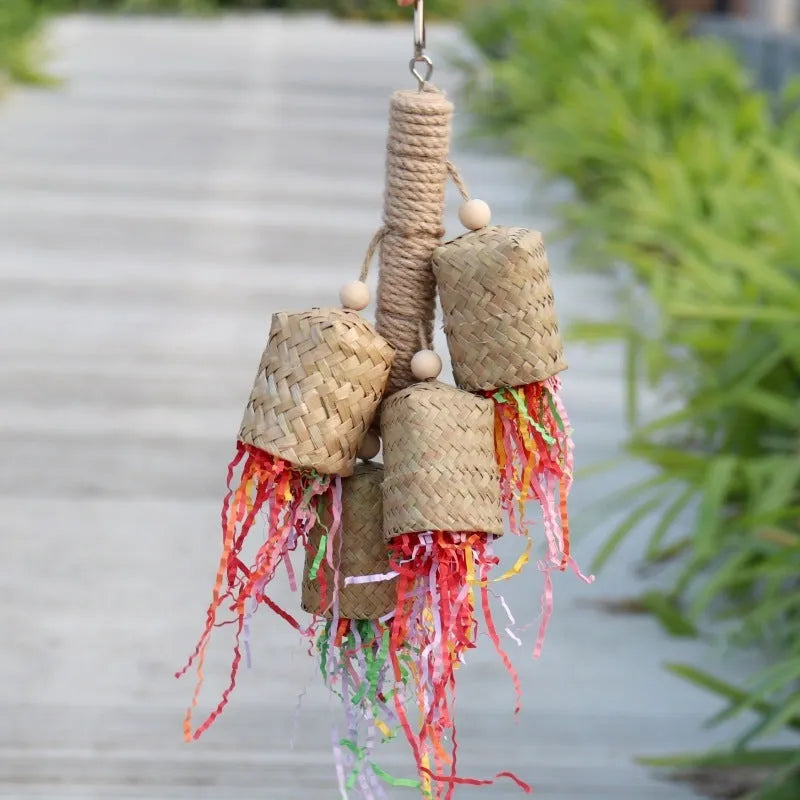 Wood and sisal parrot toy with shredded paper, measuring 15 by 35 centimetres