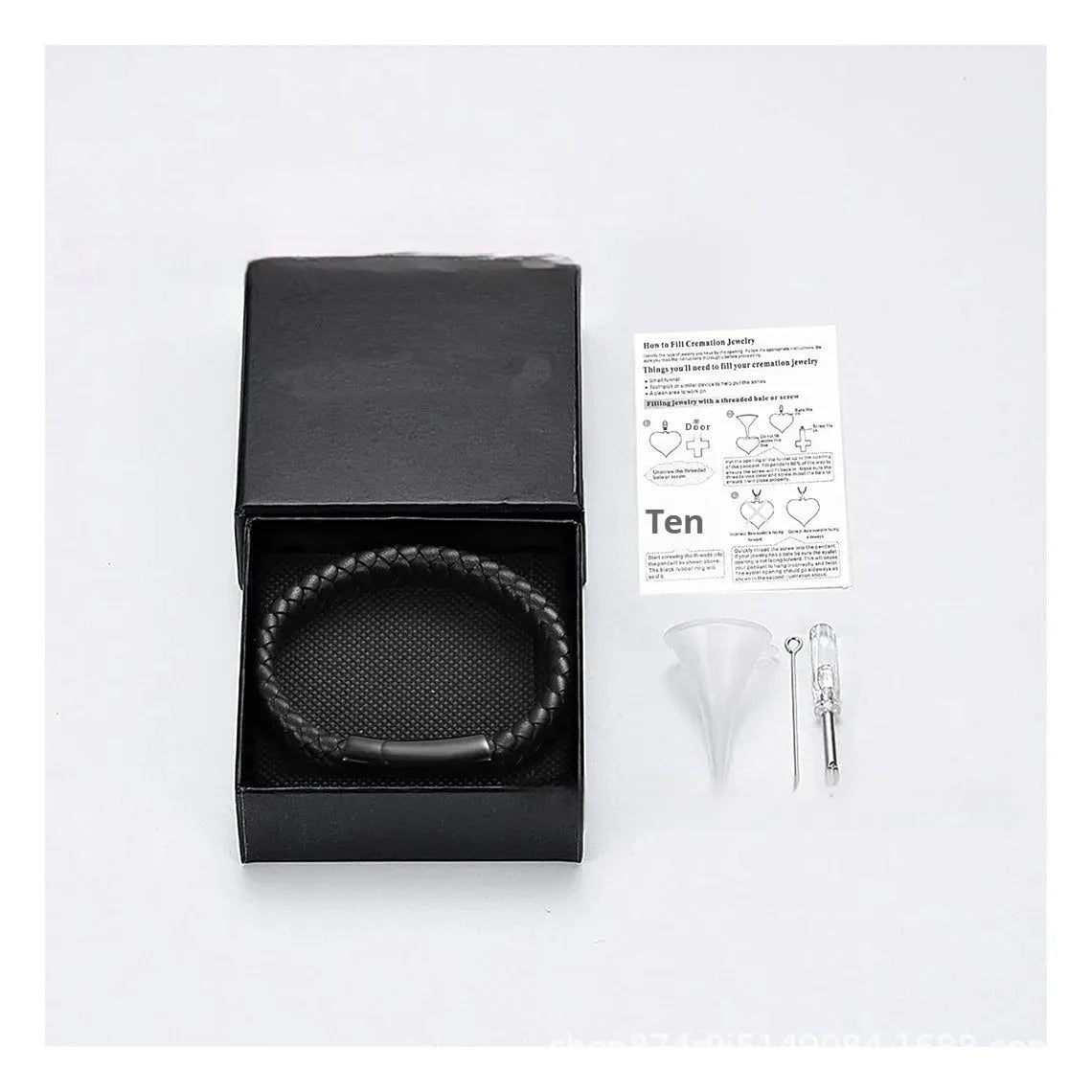 Black stainless steel memorial bracelet with woven leather detailing, showing personalisation engraving area.