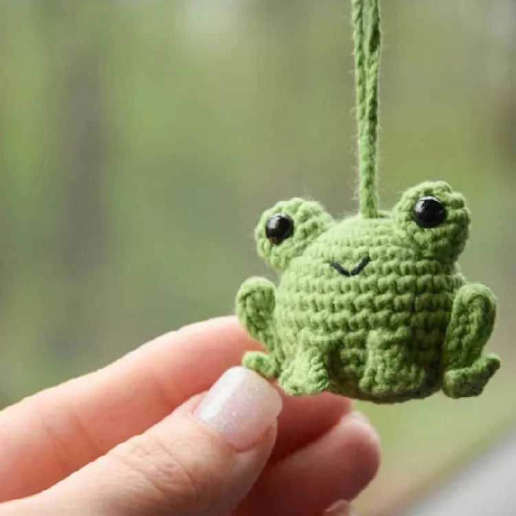 Handmade woven frog car pendant in green colour, 5cm wide by 15cm long