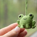 Handmade woven frog car pendant in green colour, 5cm wide by 15cm long