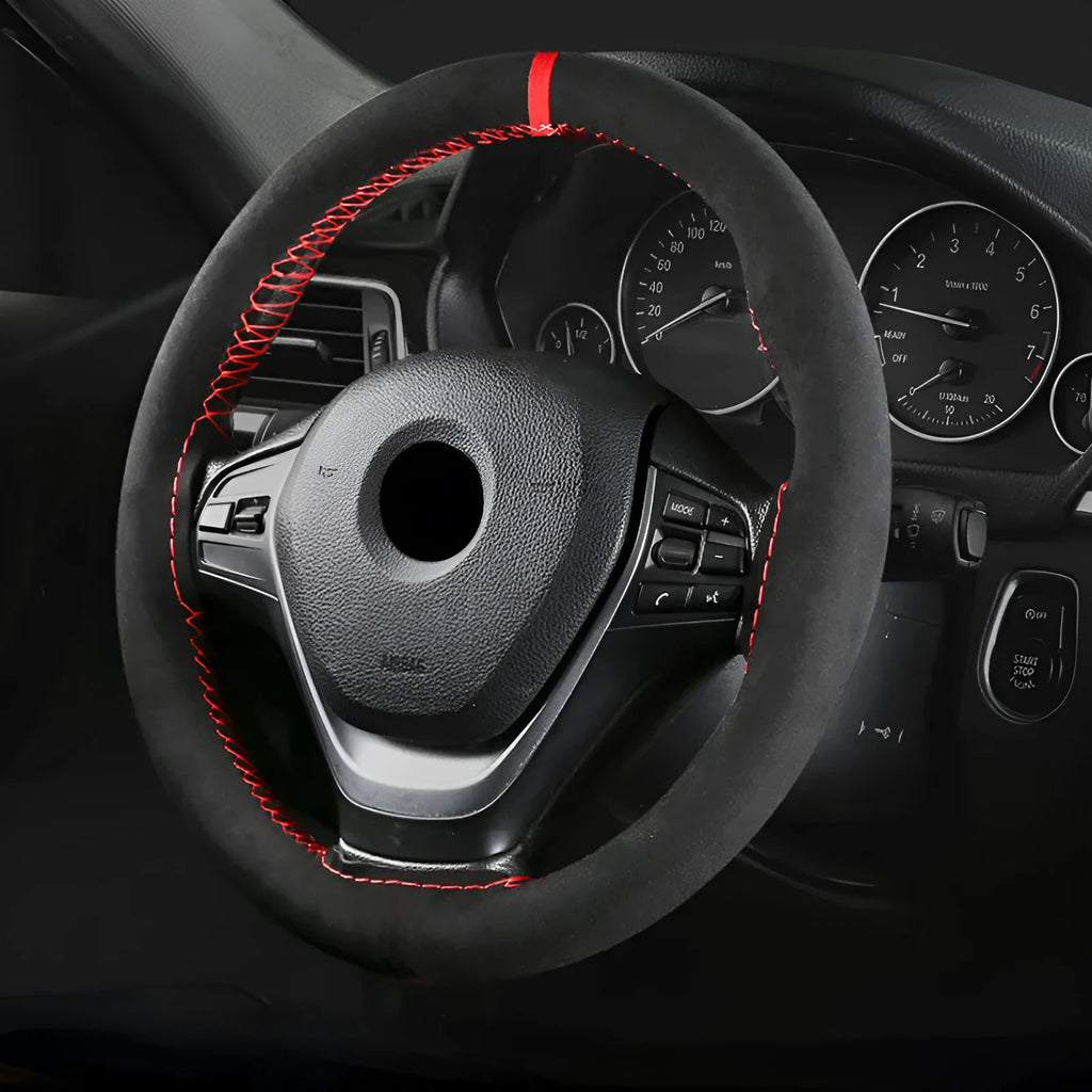 Suede microfiber steering wheel cover with black stitching, fitted on a car steering wheel, 38cm diameter