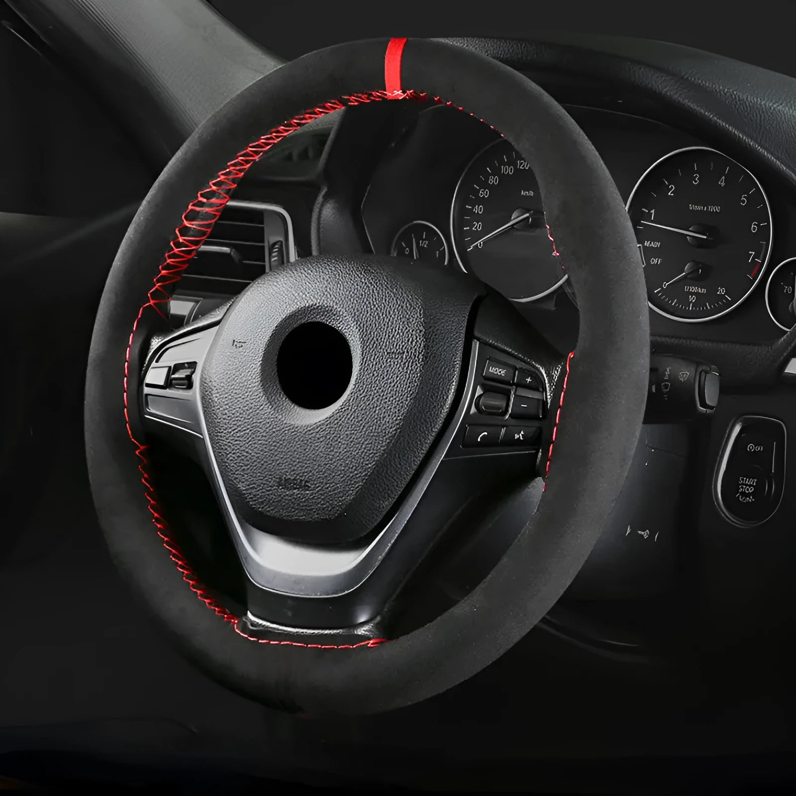 Suede microfiber steering wheel cover with black stitching, fitted on a car steering wheel, 38cm diameter