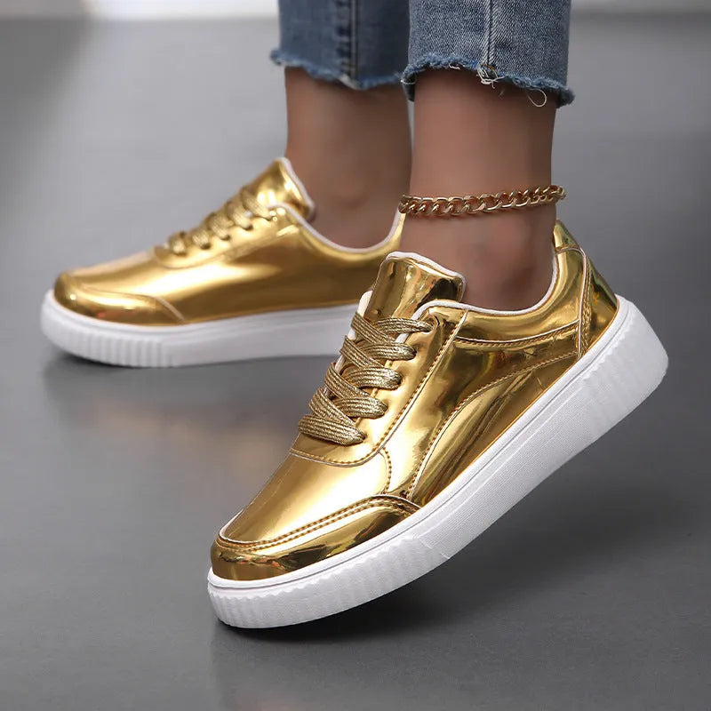 Sequin platform sneakers with thick sole in rose gold colour showing round toe and decorative stitching
