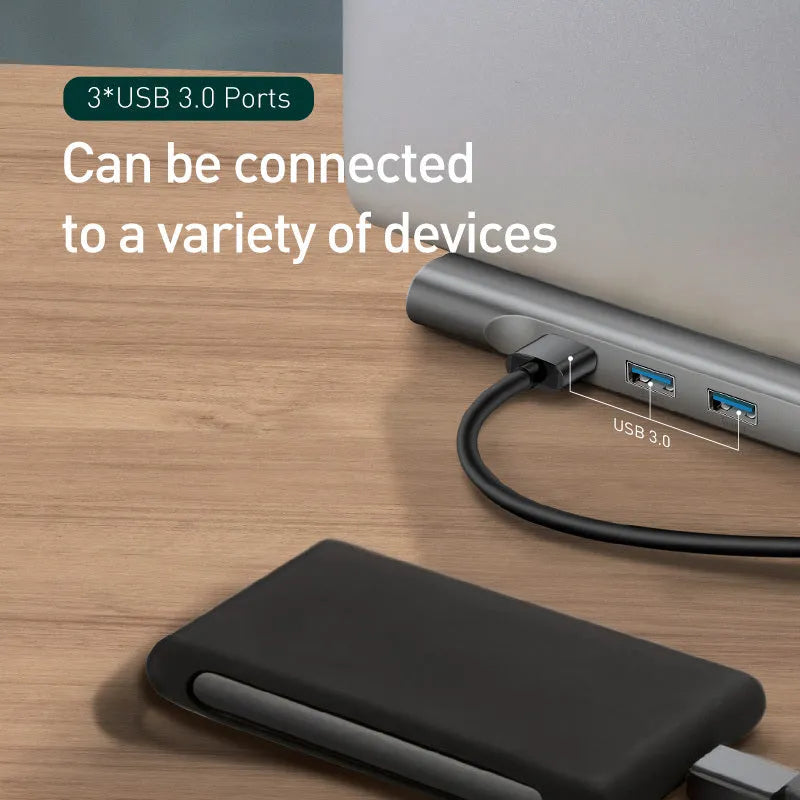 Grey aluminium USB C docking station with ten ports including HDMI, VGA, and Ethernet