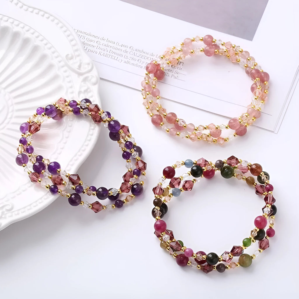 Handmade women's three-ring crystal bracelet with adjustable cord in tourmaline, strawberry quartz, or amethyst.