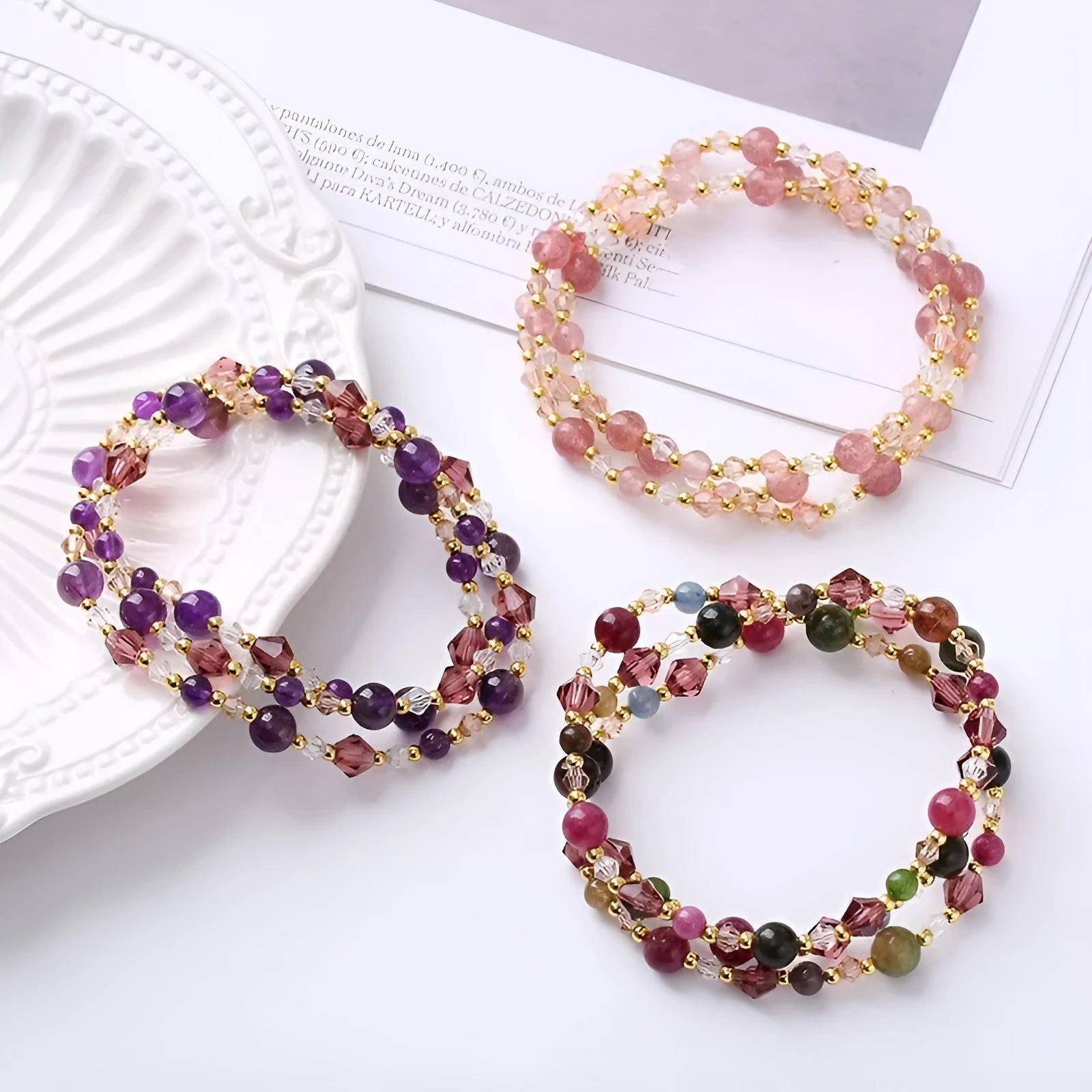 Handmade women's three-ring crystal bracelet with adjustable cord in tourmaline, strawberry quartz, or amethyst.