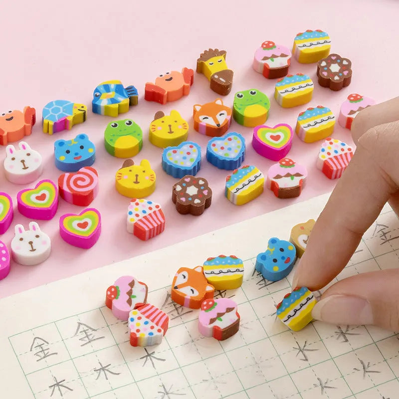 50 small colourful cartoon novelty erasers including fruit and animal shapes in a pearlescent film bag.