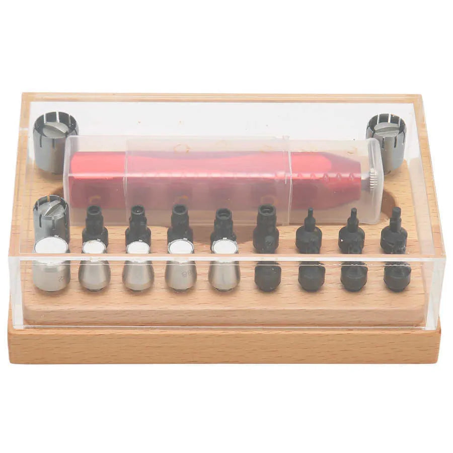 Open case showing steel watch repair tools including barrel opener, punch pliers, and 20 screwdriver bits.