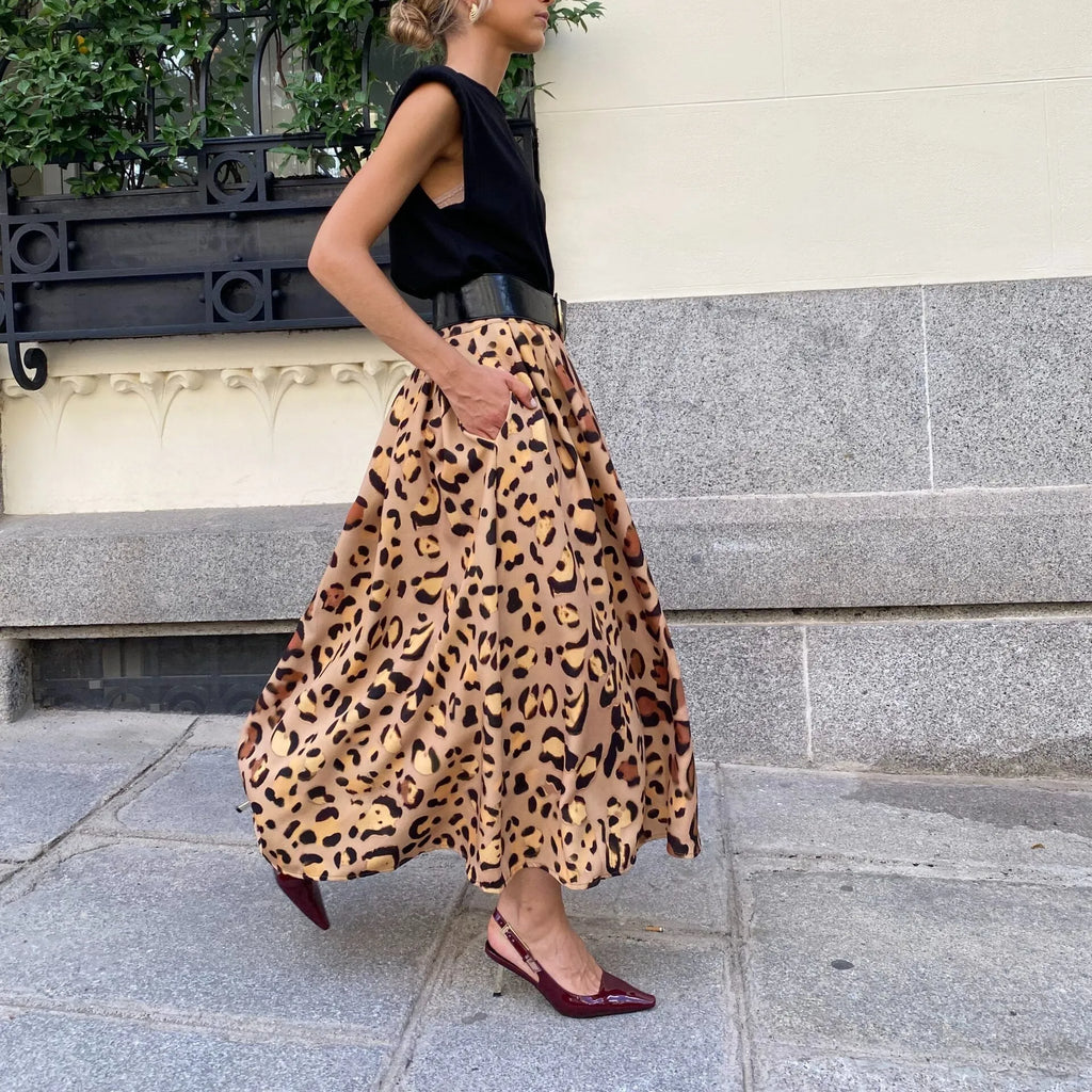 Women's brown leopard print A-line long skirt with big hem design on hanger