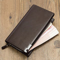 Men's long black PU leather wallet with a zipper and seven card slots laid open.