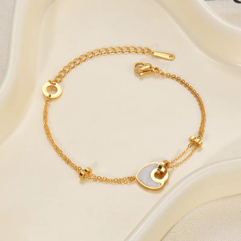 Women's stainless steel bracelet with resin heart charm and double-layer love design