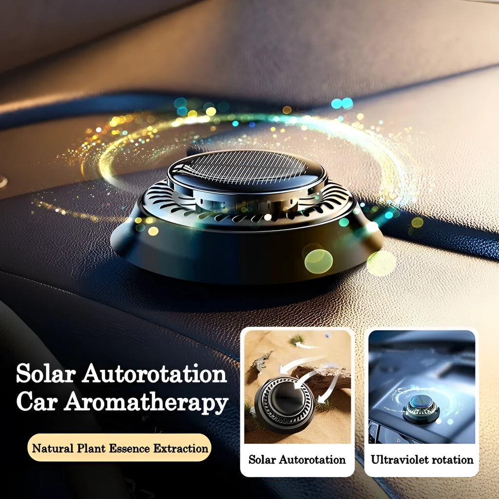 Solar-powered kinetic car air freshener with rotating black double rings on a dashboard
