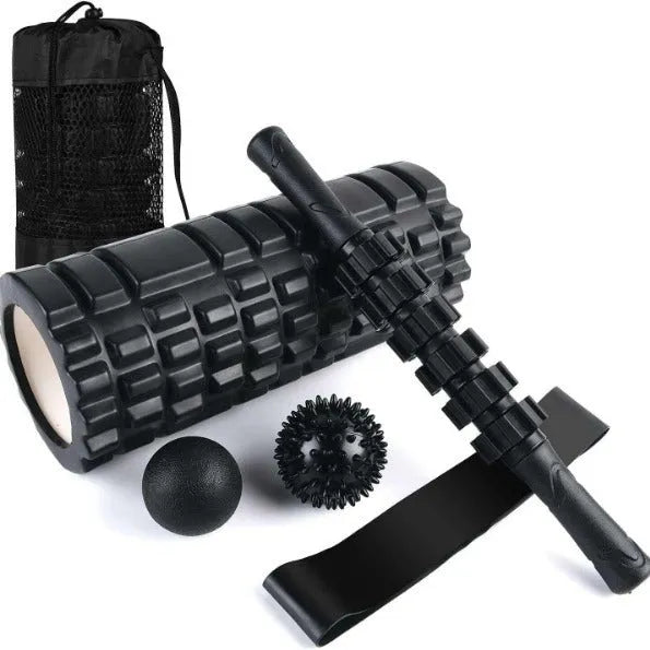 Black foam roller massage bar with gear-like segments, measuring 33cm in length