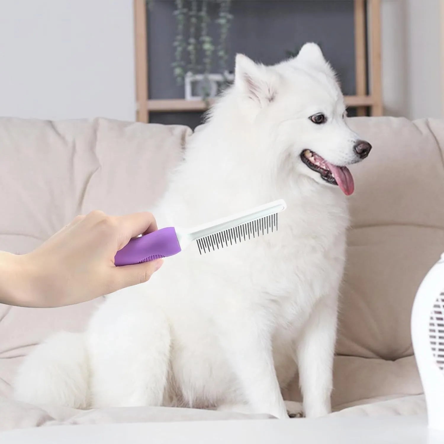Purple pet grooming comb with stainless steel teeth and ergonomic handle for detangling dog and cat fur