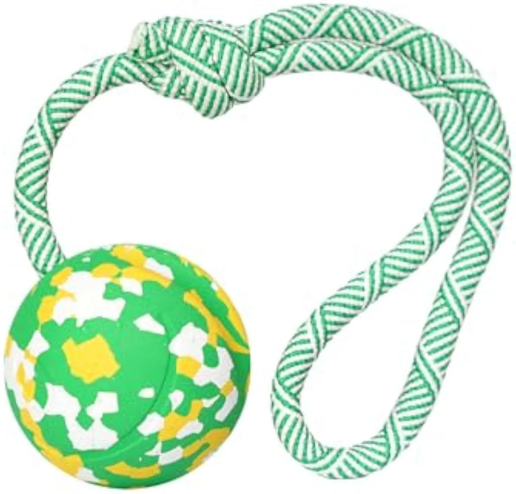 Natural rubber dog ball on a nylon rope toy for interactive fetch and tug games.