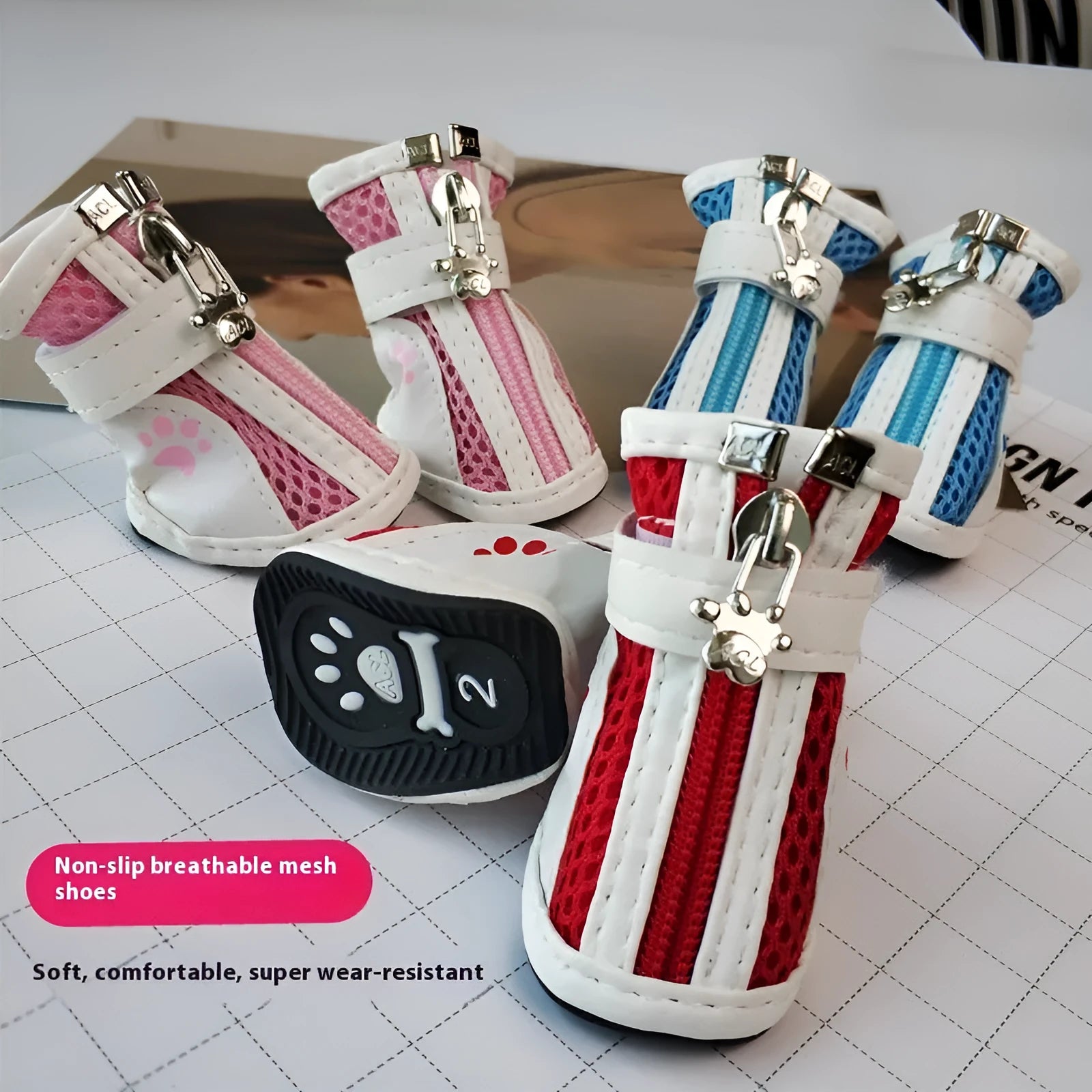 Blue, pink, and red cloth dog shoes with zippers, shown as a set of four for small breed pets.