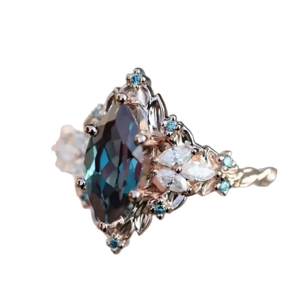 Rose gold copper ring with hollow out brushed finish and inlaid zircon stones in flower and leaf design