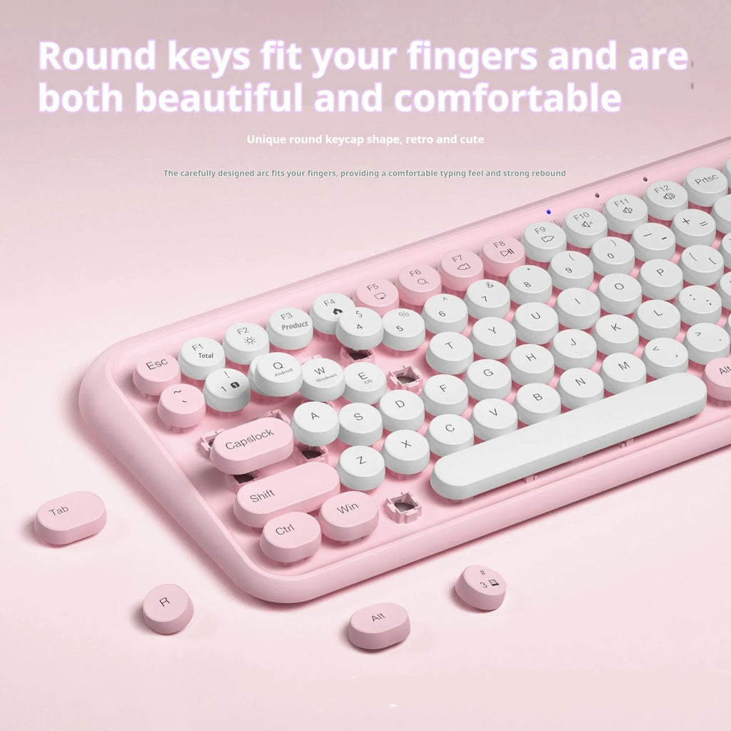 Pink wireless Bluetooth keyboard with 84 mute keys showing portable design