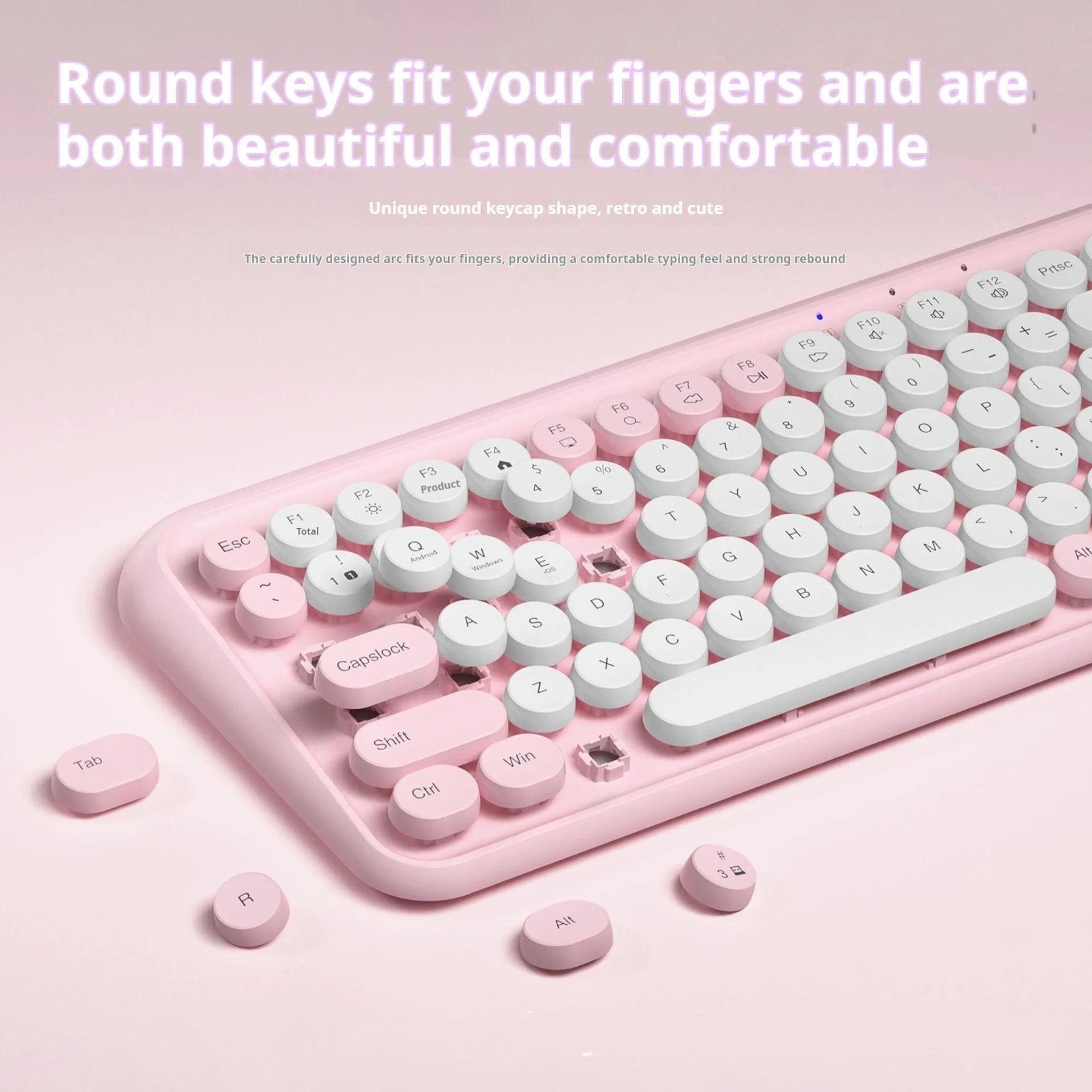 Pink wireless Bluetooth keyboard with 84 mute keys showing portable design