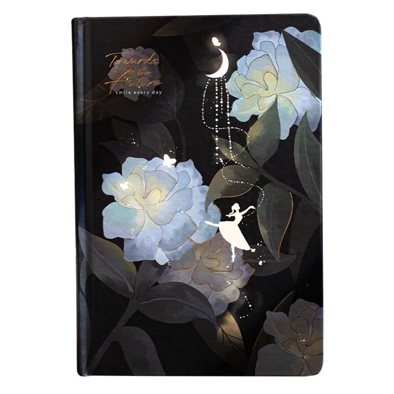 A5 notebook with luminous cover open to show pages with colour illustrations