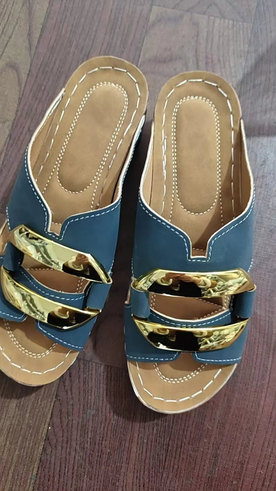 Roman style platform flip-flop sandals in a solid colour with a flat rubber sole