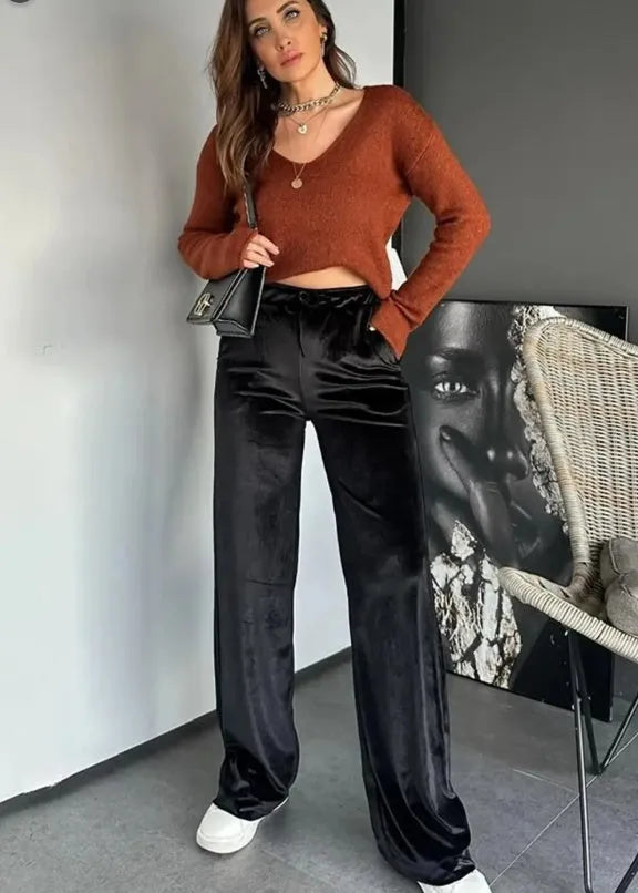 Black shiny velvet high waist drawstring straight leg casual pants on model showing full length