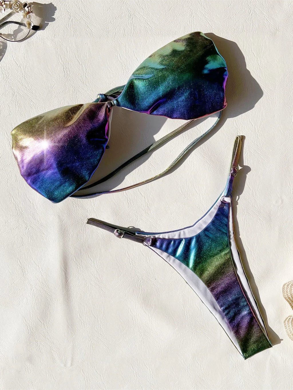 Women's gradient purple bikini swimsuit set on a mannequin