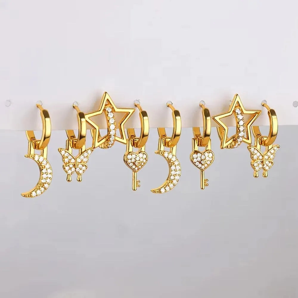 Women's geometric butterfly earrings with heart, star, and bow designs in copper with diamond treatment
