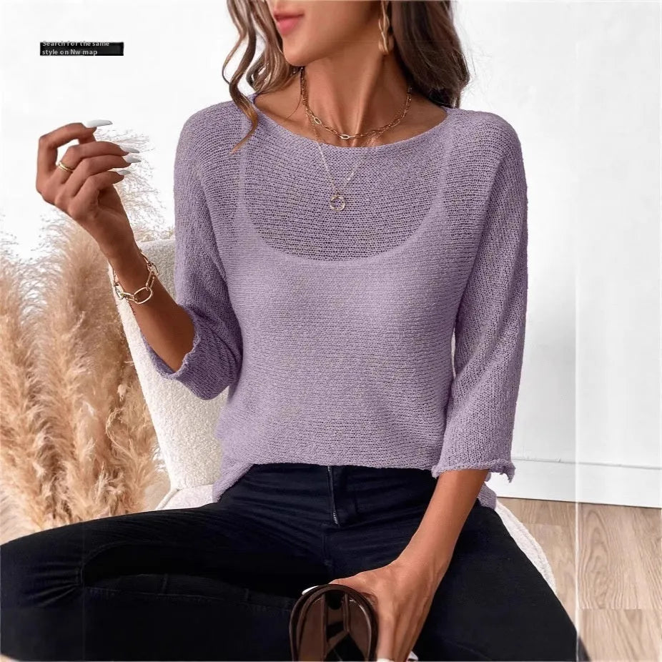 Women's knitted off-shoulder pullover top in light blue with a 3D pattern and 3/4 sleeves.