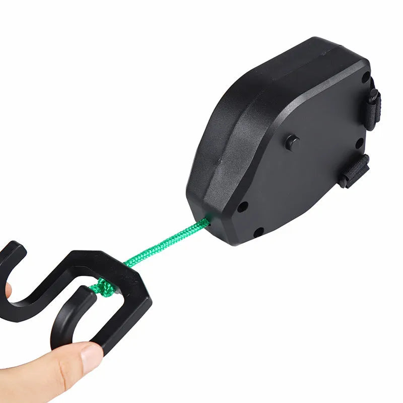 Black plastic and resin bicycle trailer towing rope for mountain bike trailer connection.