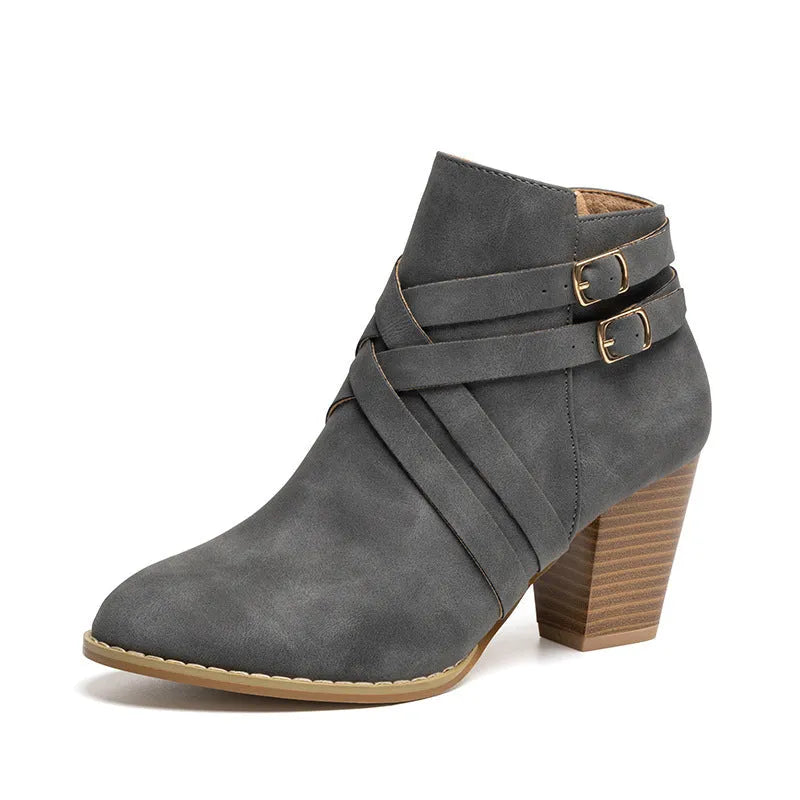 Plus size women's short boot with a 7cm stout heel and side zipper in black.