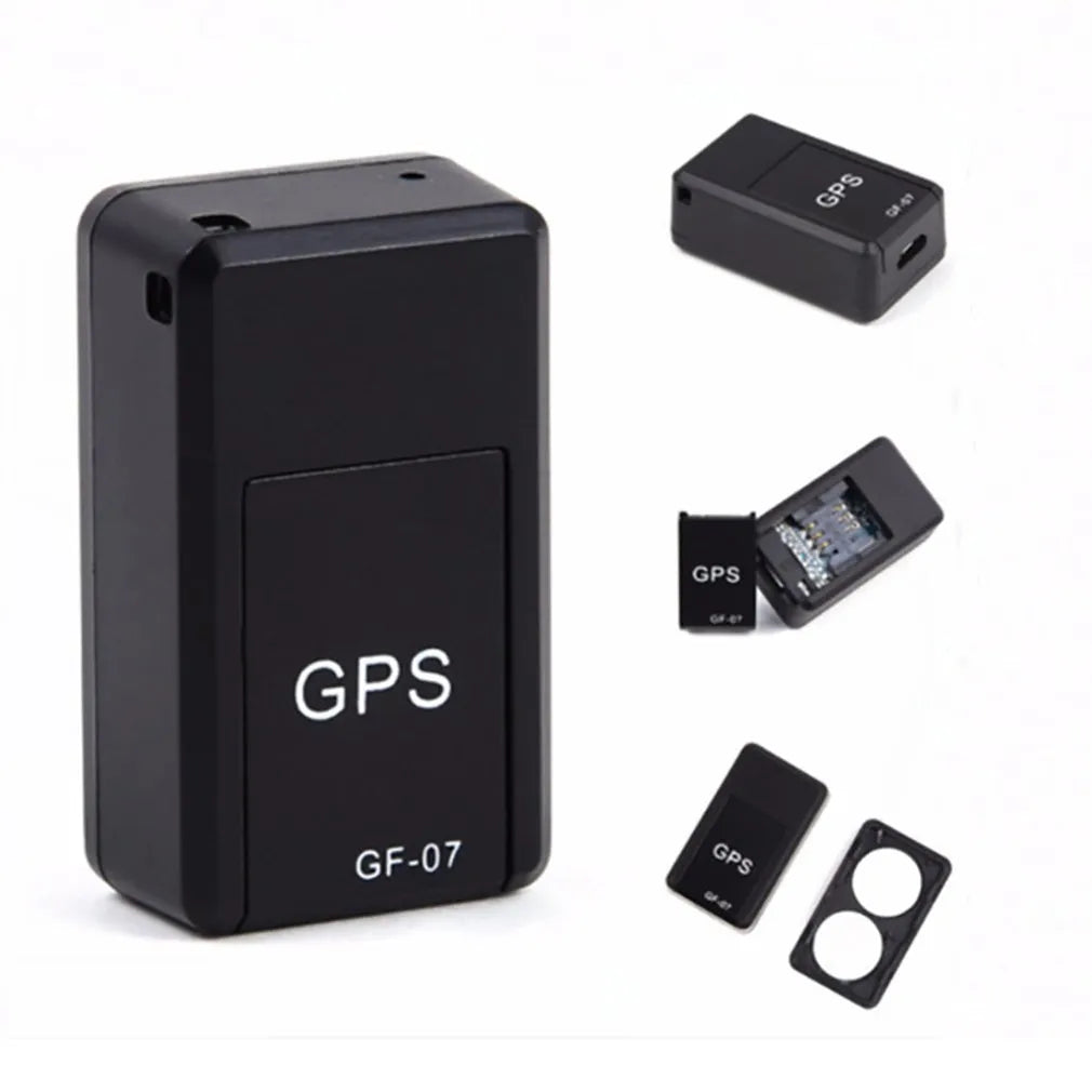 Small black magnetic GPS car tracker device for real-time vehicle and asset tracking.