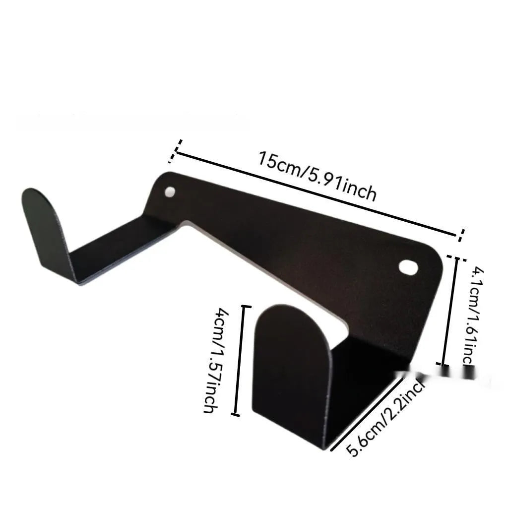 Wall-mounted iron shovel and racket hanger in black (Hanger A style) on a plain wall