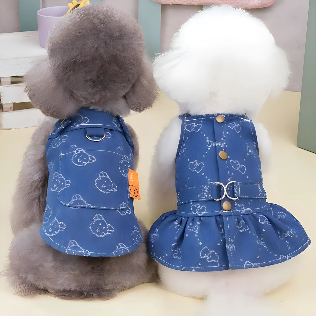 Small dog wearing denim princess dress with bracket skirt design