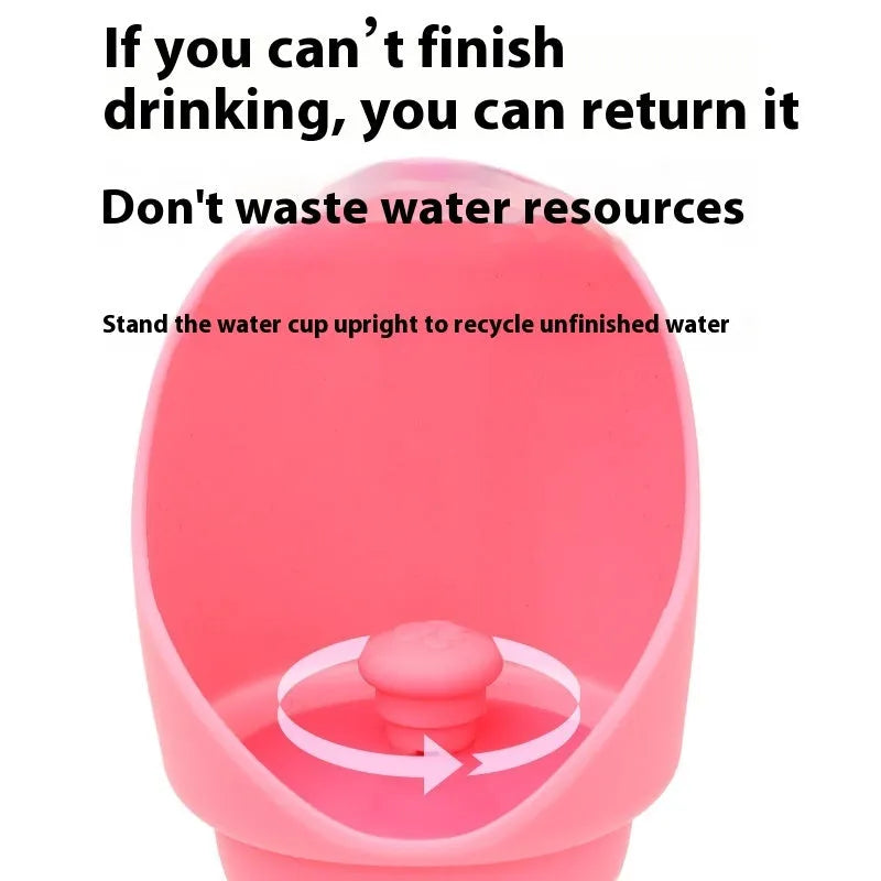 A collapsed flat and an opened pink silicone folding pet water cup on a grey background.