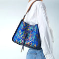 Light luxury genuine leather underarm bag in bucket shape, beige, with three-dimensional outer pocket on front