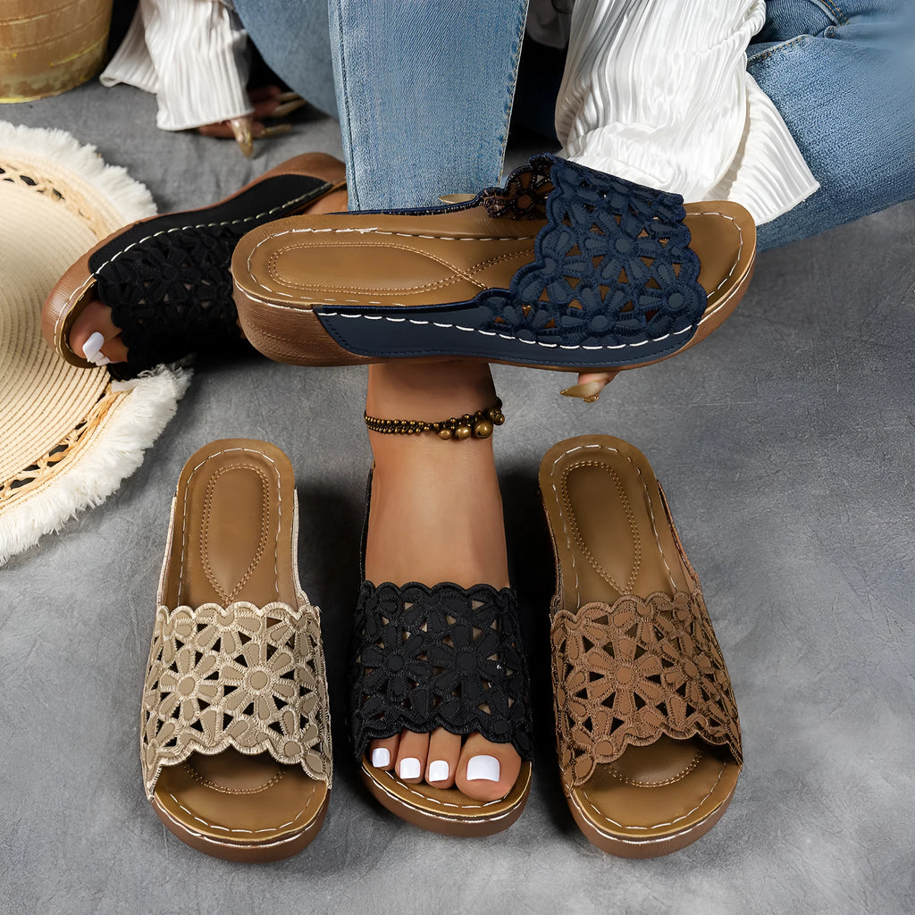 Women's flower cutout wedge beach slippers with PVC upper, fish-mouth toe, available in black, khaki, blue, light brown, sizes 36-43