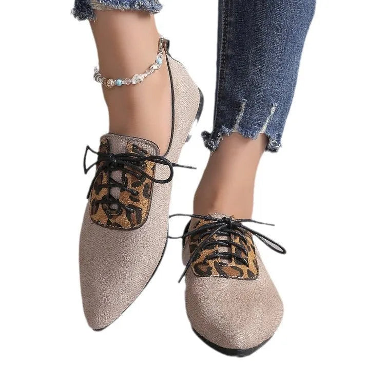 Beige leopard print women's plus size pointed toe pumps with a faux PU upper and rubber sole.