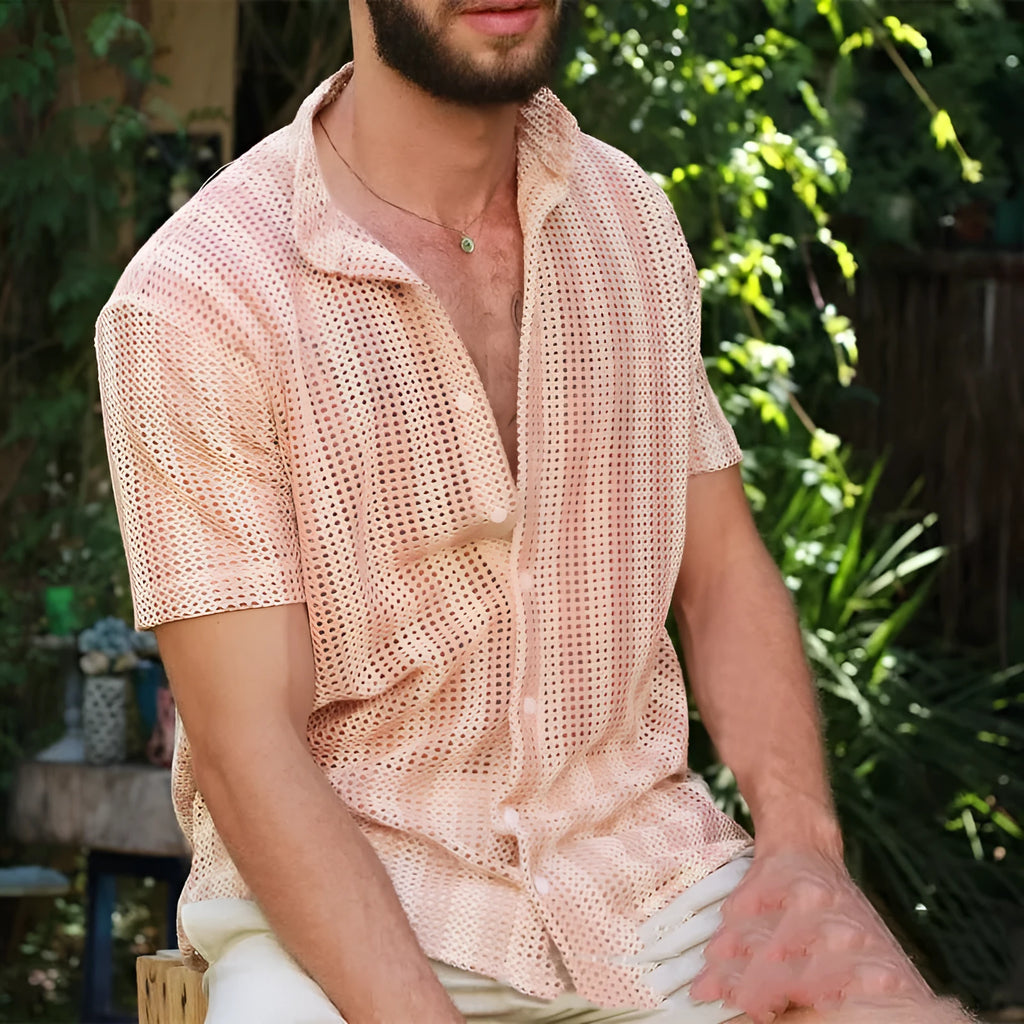 Men's pink loose-fit waffle-textured short-sleeve cardigan shirt on a hanger.