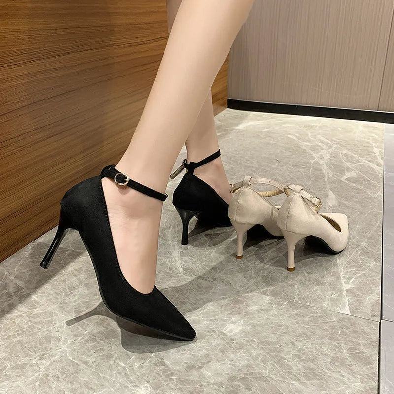 Women's black stiletto heel pump shoes with buckle detail and 8cm heel
