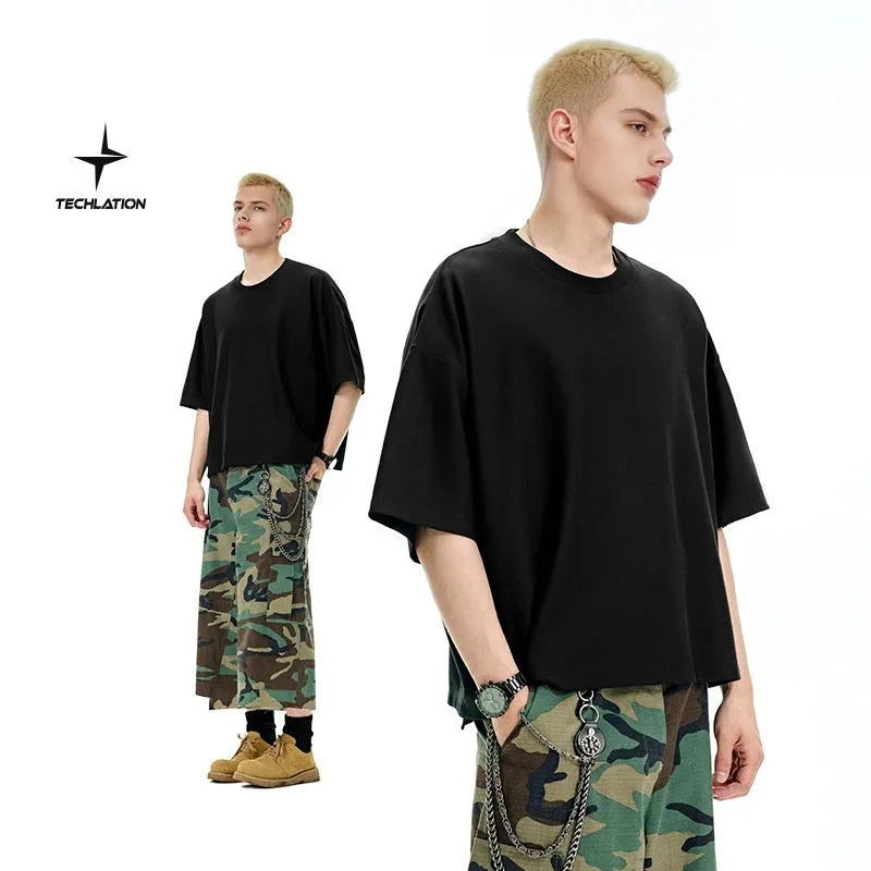 Men's sand grey loose-fit short sleeve t-shirt on a hanger.